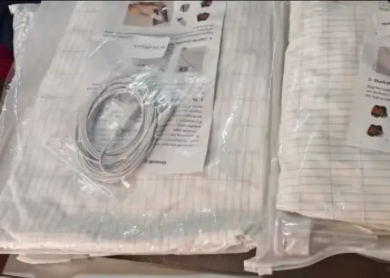 Official Velin Grounding Bed Sheets package with cord and tester components