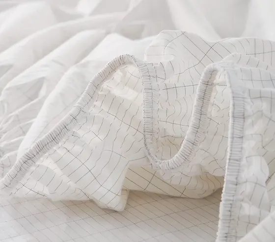 Close view of the pale quilted Velin weighted blanket fabric